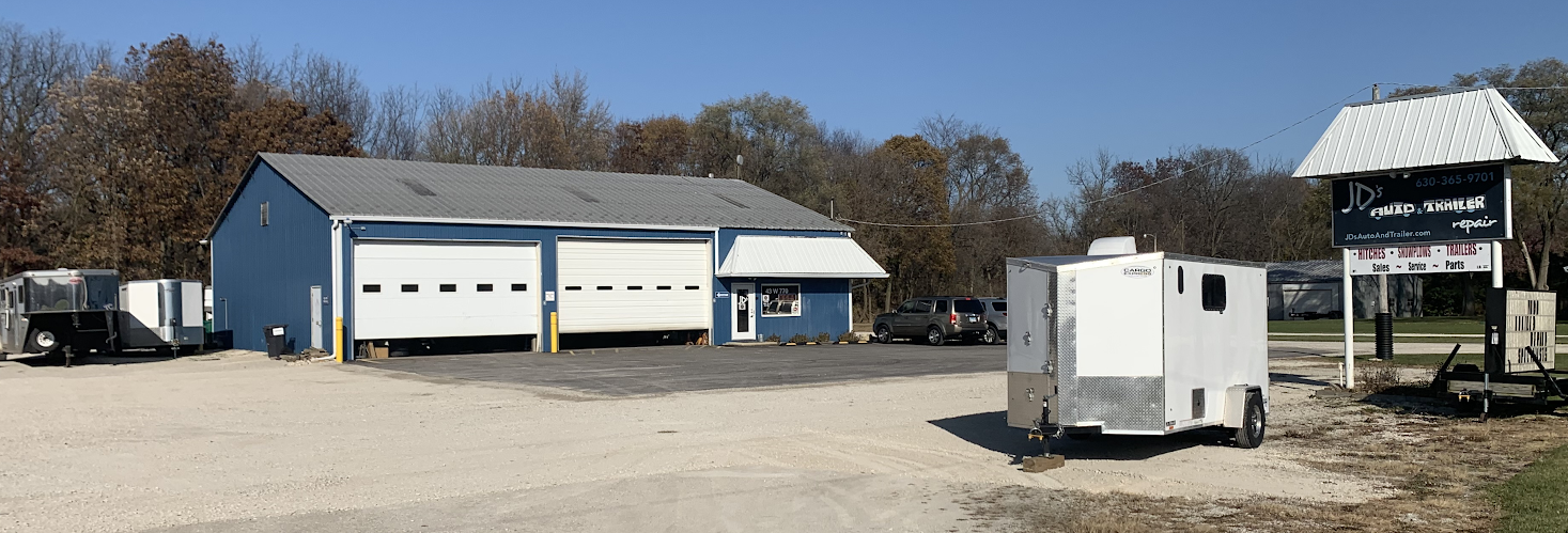 Repair shop with blue and white building.