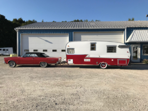 Red & White Aluminum Camper.